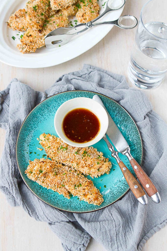 Chicken tenders recipes are great to have on hand for busy weeknights. This one includes the savory-sweet flavors of teriyaki sauce. 236 calories and 5 Weight Watchers Freestyle SP #chickentenders #easydinnerrecipes