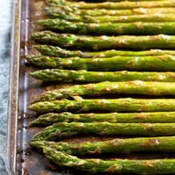 Only 5 ingredients needed for this delicious and healthy Smoked Paprika Roasted Asparagus side dish recipe! It's a great vegan option for springtime. 47 calories and 1 Weight Watchers Freestyle SP #asparagus #weightwatchers #sidedish