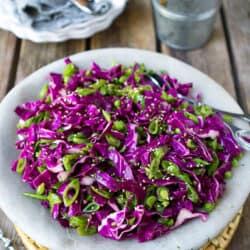 Have you ever made a slaw with snap peas? Bursting with flavor and color, this Hoisin Snap Pea & Red Cabbage Slaw is fantastic on its own or piled on sliders or tacos. 85 calories and 2 Weight Watchers Freestyle SP. #weightwatchers #slaw #healthy