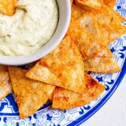 It takes mere minutes to make homemade baked tortilla chips. Sprinkled with smoked paprika and rosemary, these ones are something special! 78 calories and 2 Weight Watchers Freestyle SP #snacks #healthy #weightwatchers