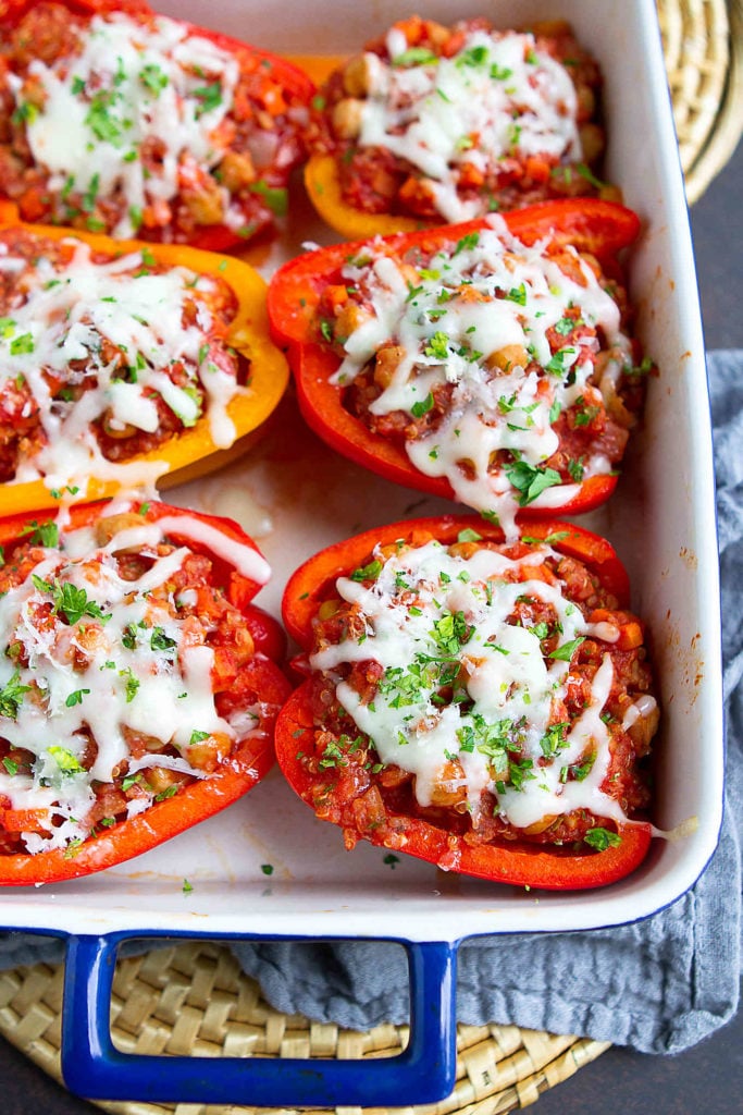 Why should meat lovers get to have all the fun?! These healthy Italian-Style Vegetarian Stuffed Peppers are packed with all of the flavors of this classic dish. 249 calories and 3 Weight Watchers SP | Quinoa | Chickpeas | Recipe #stuffedpeppers #vegetarianstuffedpeppers #vegetarianreccipes