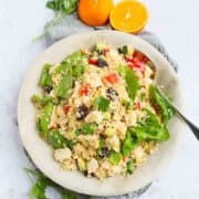The ultimate potluck salad! This Moroccan Chicken Quinoa Salad can be made ahead of time and serves up a ton of flavor in every bite. 251 calories and 5 Weight Watchers Freestyle SP #quinoa #weightwatchers #glutenfree