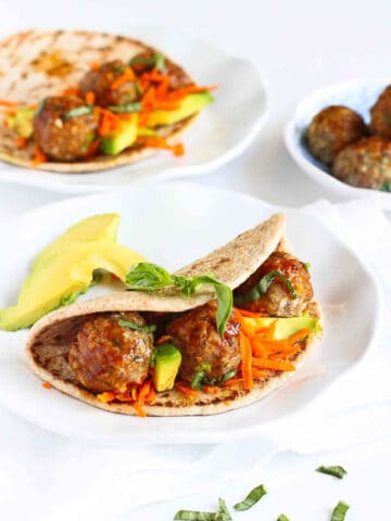 This takes meatball sandwiches to a whole new level! The flavors in this Asian Meatball Sandwich recipe are beyond delicious. Sweet and savory, with a side of healthy. 341 calories and 9 Weight Watchers Freestyle SP #sandwich #meatballs #avocado