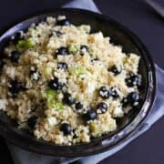 Punch up the flavors of your summertime meal with a dose of this Quinoa, Avocado and Blueberry Salad, finished off with feta cheese and a tangy lime vinaigrette. The perfect potluck salad! 121 calories and 4 Weight Watchers Freestyle SP #quinoa #saladrecipes #weightwatchers