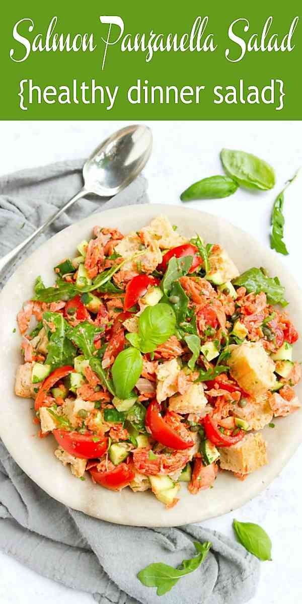 This panzanella salad recipe takes a non-traditional turn with the addition of salmon. So much flavor and perfect for a light summertime dinner. 377 calories and 5 Weight Watchers Freestyle SP #summersalads #salmon #panzanellasalad #wwfreestyle