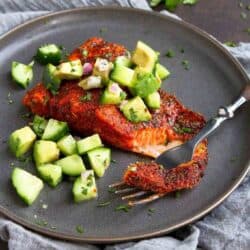 Straight from Skinnytaste's new cookbook, this Blackened Air Fryer Salmon recipe, topped off with a fresh cucumber-avocado salsa, has the perfect texture & just the right amount of heat. 340 calories and 3 Weight Watchers SP #airfryer #salmonrecipes #weightwatchers