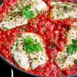 Poached fish is one of the easiest healthy weeknight recipes you can make, and it gets even better when simmered in a quick homemade tomato sauce. 274 calories and 2 Weight Watchers SP #fish #healthyrecipes #weightwatchers