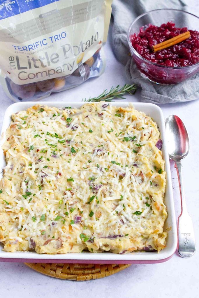 Make ahead or serve this mashed potato casserole straight from the oven. Fantastic for Thanksgiving or other holiday meals. 141 calories and 4 Weight Watchers SP | Thanksgiving | Holidays | Make Ahead | Side Dishes | With Cream Cheese | Easy | Without Sour Cream | For A Crowd #mashedpotatorecipe #weightwatchers #thanksgivingsides #Littlepotatoes
