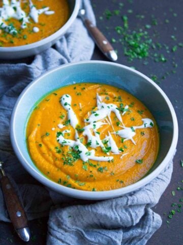 Creamy soup without the cream! This silky spiced Moroccan Carrot Soup is thickened with chickpeas and screams comfort with every bite. Serve it as an appetizer or light lunch. 166 calories and 1 Weight Watchers SP | Vegan | Vegetarian | Easy | Cream of | Dairy Free #carrotsoup #vegansoups #veganrecipes #weightwatchers #wwfreestyle