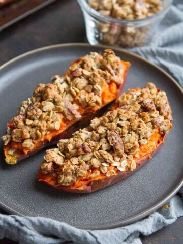 Ditch the marshmallows and top your holiday sweet potatoes with a lightened-up pecan streusel topping that's sweetened with maple syrup. 240 calories and 10 Weight Watchers SP | Healthy | Easy | Savory | Thanksgiving | Side Dish | Holiday Recipes | Vegan | Vegetarian | Make Ahead #sweetpotatorecipes #thanksgivingrecipes #sidedishes #weightwatchers #holidayrecipes