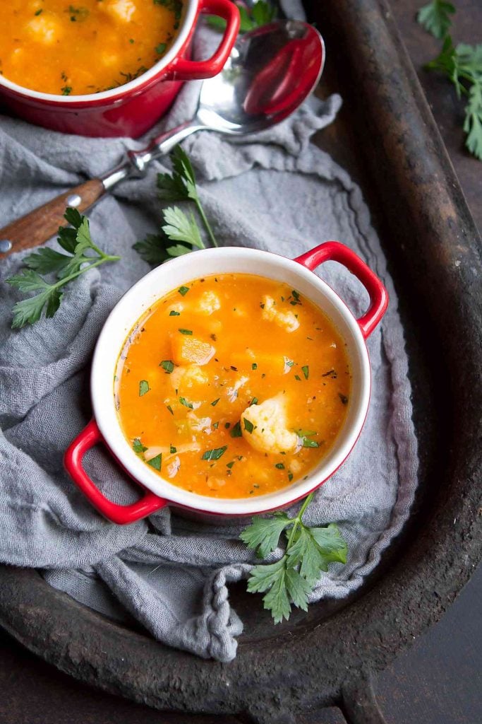 A recipe for a healthy and satisfying meal - this winter vegetable soup, with butternut squash and cauliflower is one to make again and again. 98 calories and 1 Weight Watchers SP | Healthy | Vegan | Vegetarian | Recipes #healthysouprecipes #lunchrecipes #healthysoups #wwfreestyle 
