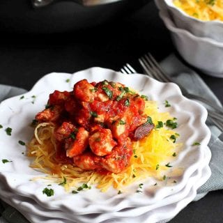 Spaghetti squash makes a fantastic, healthy meal when topped with an easy chicken puttanesca sauce. 220 calories and 1 Weight Watchers SP | Recipe | Authentic | Spicy | Gluten Free | Easy | Quick | Recipes #puttanescasauce #chickenrecipes #spaghettisquash #smartpoints #weightwatchers