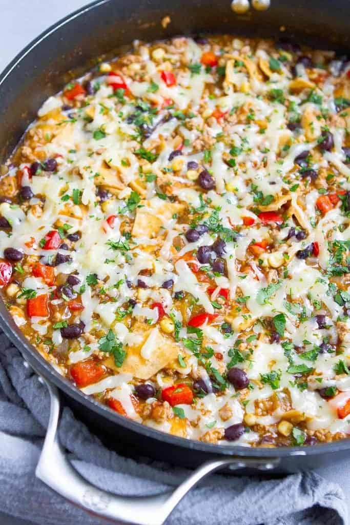 This one-pot Ground Turkey Enchilada Skillet Meal got rave reviews all around from my family. This will be a regular at our dinner table, for sure! 375 calories and 6 Weight Watchers SP | Healthy | Recipe | Easy | One Pot | One Pan | Green #groundturkey #enchiladas #onepotmeal #onepanmeal #healthydinners #wwrecipes #smartpoints