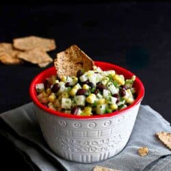 Fresh, crunchy and addictive! This jicama, black bean and corn salsa is great as a healthy, low calorie snack or served over grilled chicken or fish. 36 calories and 0 Weight Watchers SP | Recipe | Easy | Dip | Mexican | Fresh | Vegan | Gluten Free | Plant Based | Tailgating | Super Bowl #veganappetizers #superbowl #veganrecipes #cornsalsa #tailgating #cleaneating #weightwatchers #plantbased