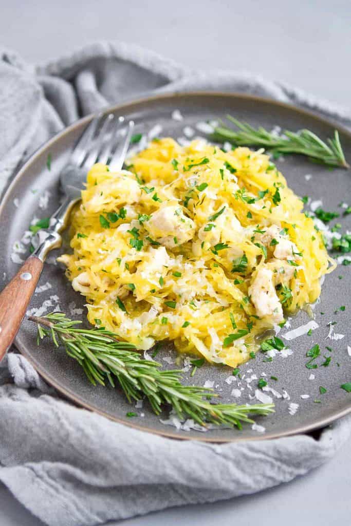 If there's someone in the family that doesn't like spaghetti squash, try out this Parmesan Herb Spaghetti Squash recipe on them. It changed my son's mind! 244 calories and 3 Weight Watchers SP | Healthy | Garlic | Low Carb | Gluten Free | Quick | Easy | Chicken | Dinner #spaghettisquash #wwrecipes #smartpoints #chickenrecipes #healthydinnerrecipes