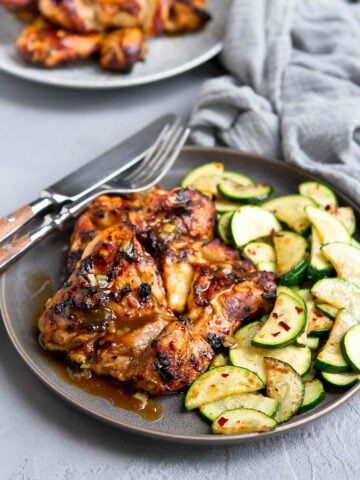 The glaze on these Honey Balsamic Air Fryer Chicken Thighs is to die for! A quick and easy chicken recipe with tons of flavor. 276 calories and 7 Weight Watchers SP | Boneless | Skinless | Healthy | Gluten Free | Fast | Marinade #airfryer #chickenthighs #chickenrecipes #airfryerchicken #wwrecipes #smartpoints