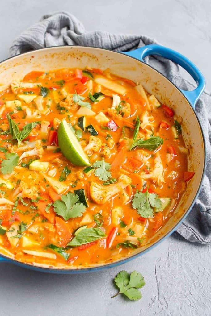 Add some kick to your meatless meals with this delicious and veggie-packed Vegan Thai Red Curry! It uses ingredients found in most grocery stores & it's a breeze to make. 189 calories and 6 Weight Watchers SmartPoints | Vegetarian | Plant Based | Curry Paste | Recipe | Sauce | Coconut Milk | Easy | Spicy | Healthy #plantbased #vegancurry #thaicurry #vegandinnerideas #wwrecipes #smartpoints