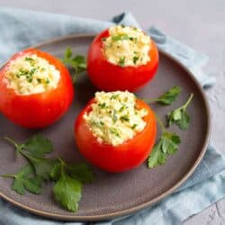 While we all love a good egg salad sandwich, these Egg Salad Stuffed Tomatoes are a fantastic way to lighten things up for brunch or lunchtime. 125 calories and 1 Weight Watchers SP | Healthy | Vegetarian | Celery | Recipe | Tomato | Low Carb | Easy | Easter | Hard Boiled Eggs #stuffedtomatoes #easterrecipes #brunch #weightwatchers #eggsalad #vegetarianbrunch