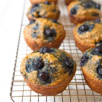 Banana blueberry muffins on a wire rack