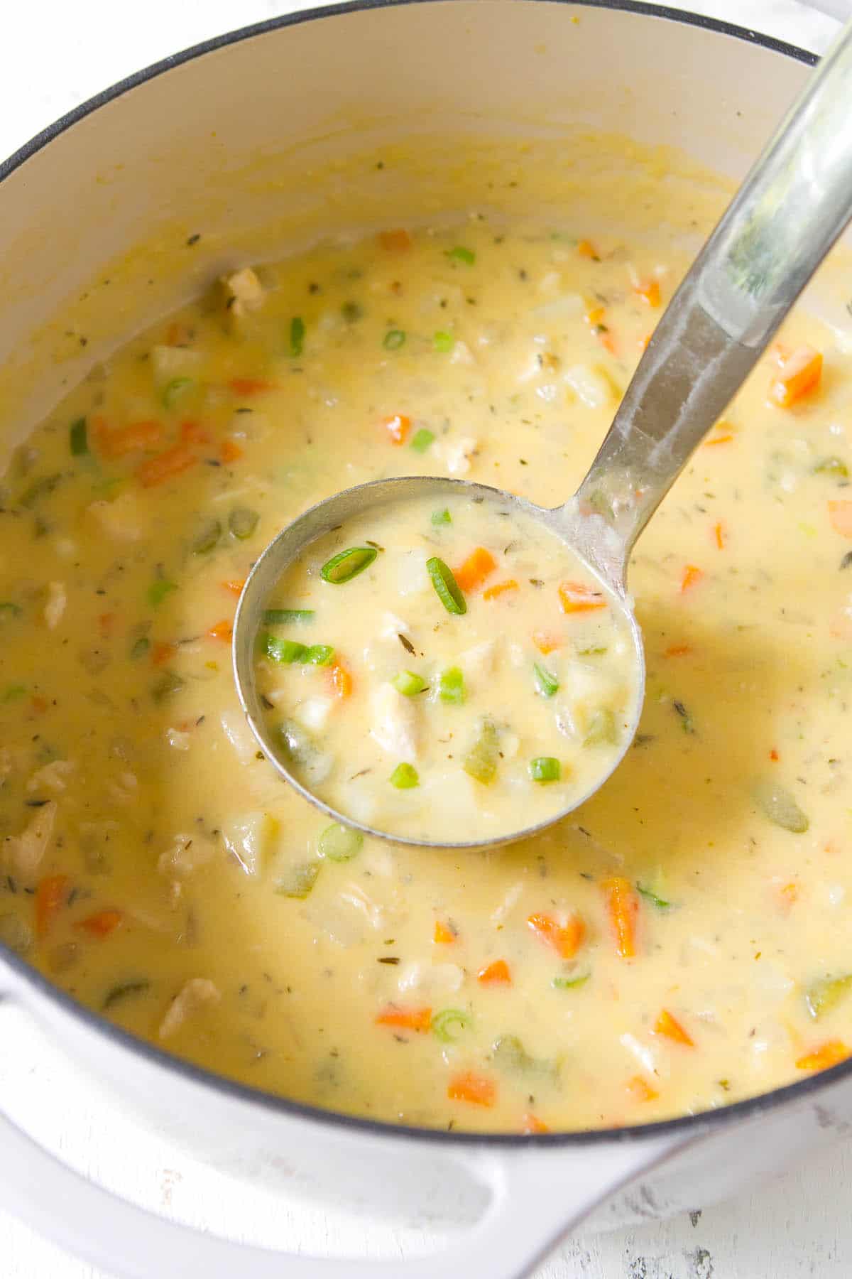 A huge hit with my family! This light version of chicken potato soup, made without heavy cream, is a great way to warm up on a chilly day. | Recipes | Easy | Healthy