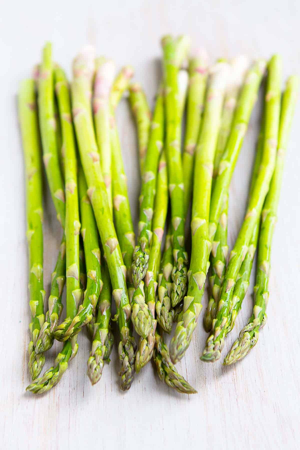 Asparagus spears on a white background.