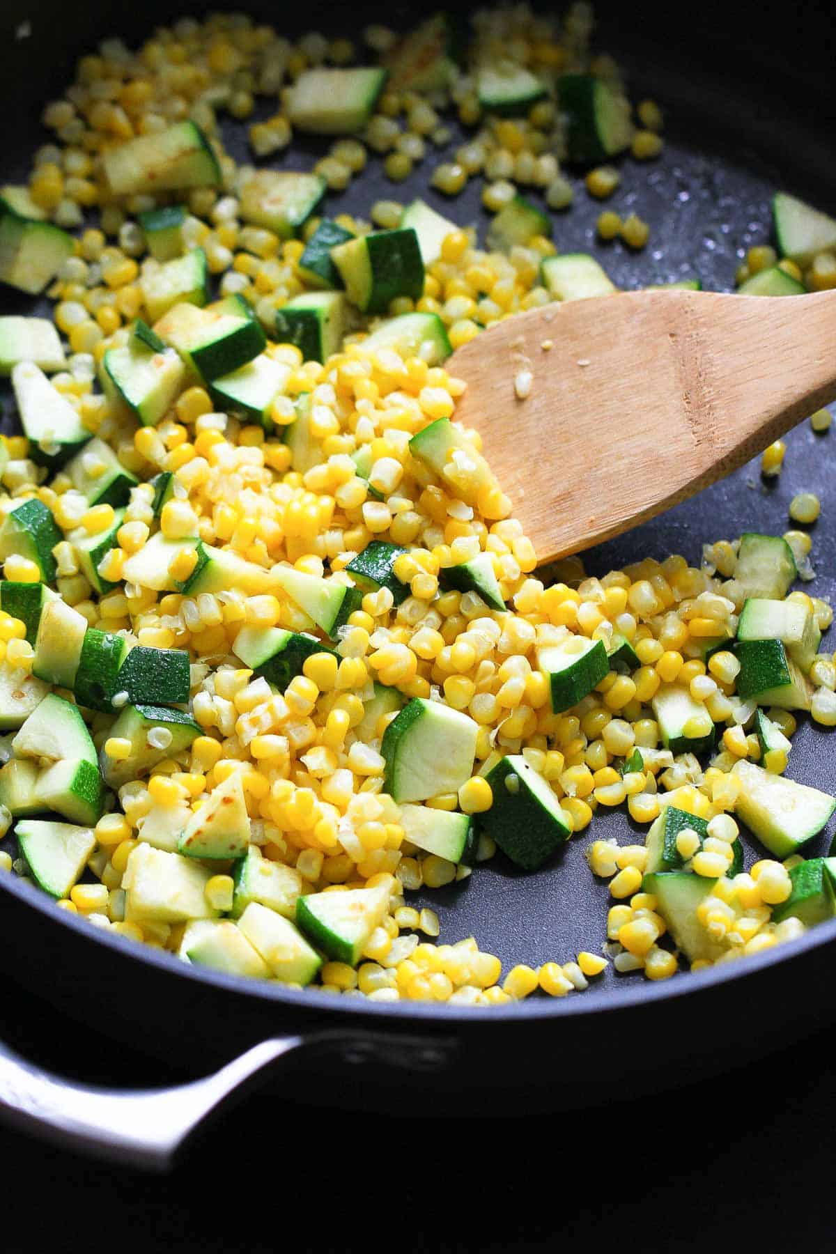 Corn kernels and chopped celery in a nonstick skillet.