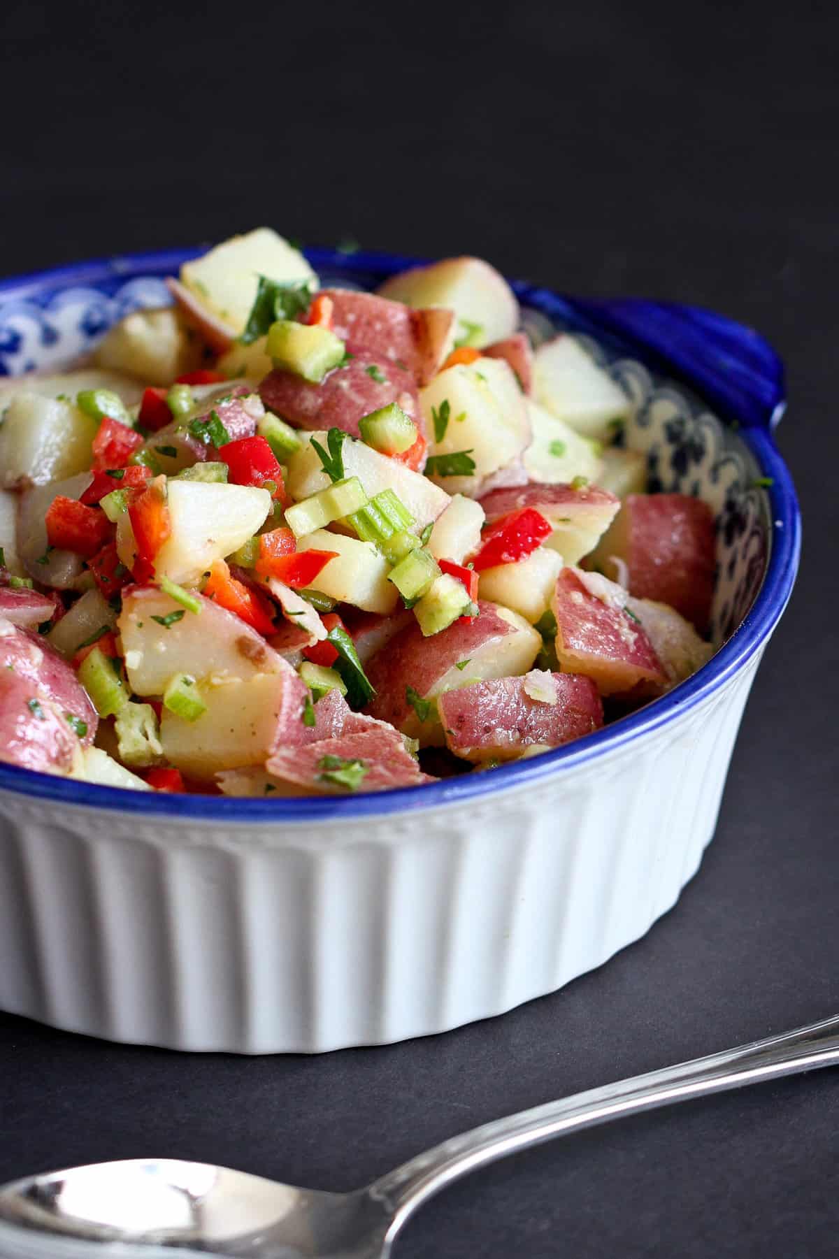 Say goodbye to the heavy, gloopy potato salads of the past – our Skinny Red Potato Salad without mayo is here to revolutionize your taste buds! Packed with colorful veggies and dressed in a zesty vinaigrette, it's the perfect way to indulge in a healthy meal. | No mayo | Recipe easy | No egg | Vegan | Plant based | WFPB | Vegetarian