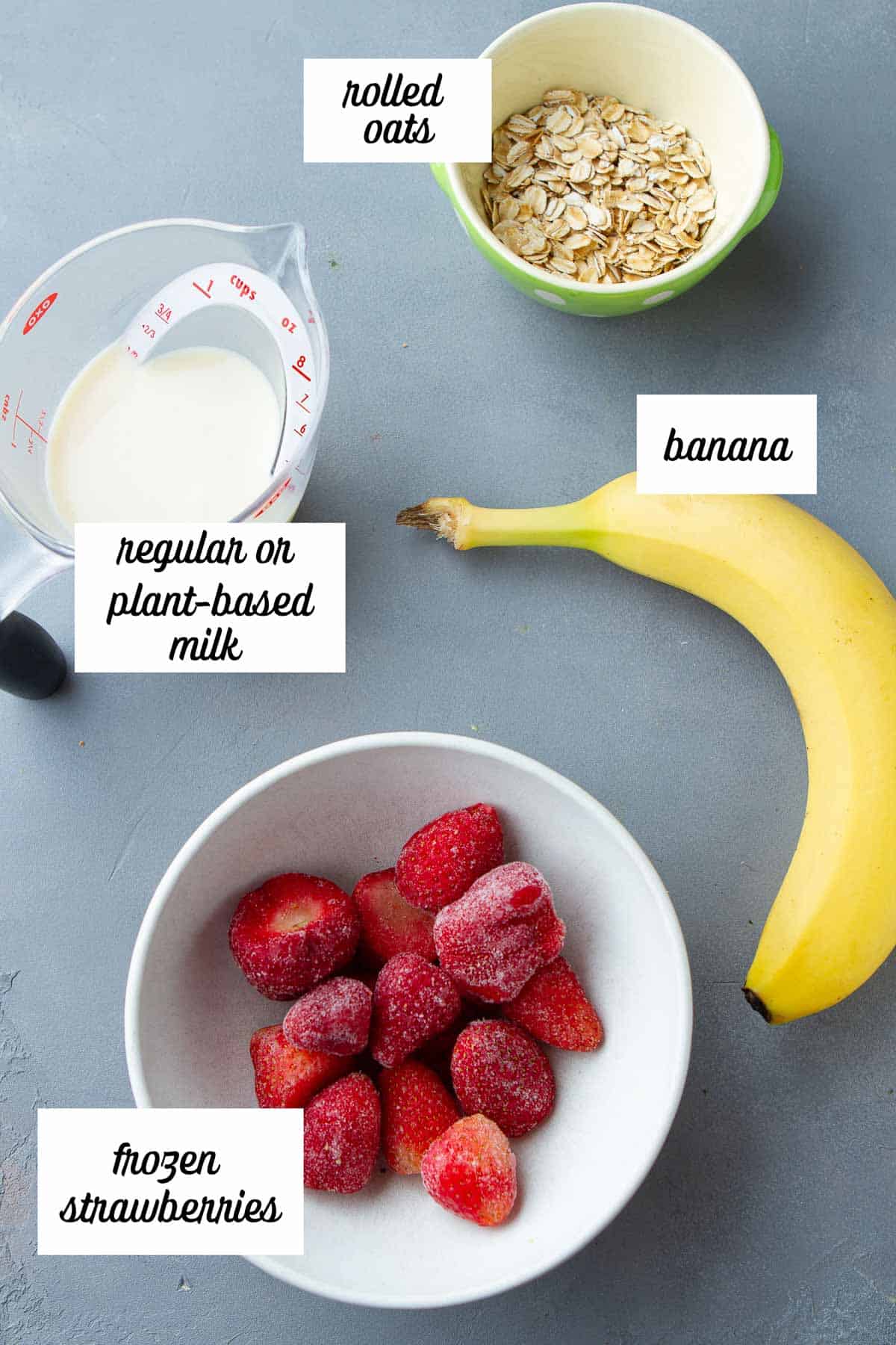 Labeled ingredients for a strawberry banana smoothie.