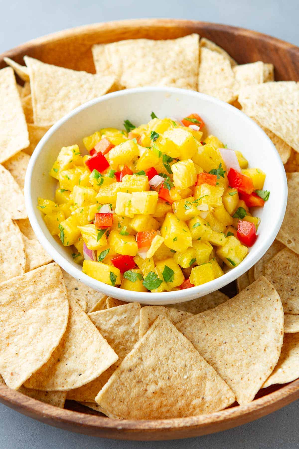 Create a tasty and colorful pineapple-mango salsa by blending the spicy sweetness of pineapple and mango with a spicy kick of jalapeño.  Use it as a sauce, taco topping, or marinade for grilled fish or chicken.