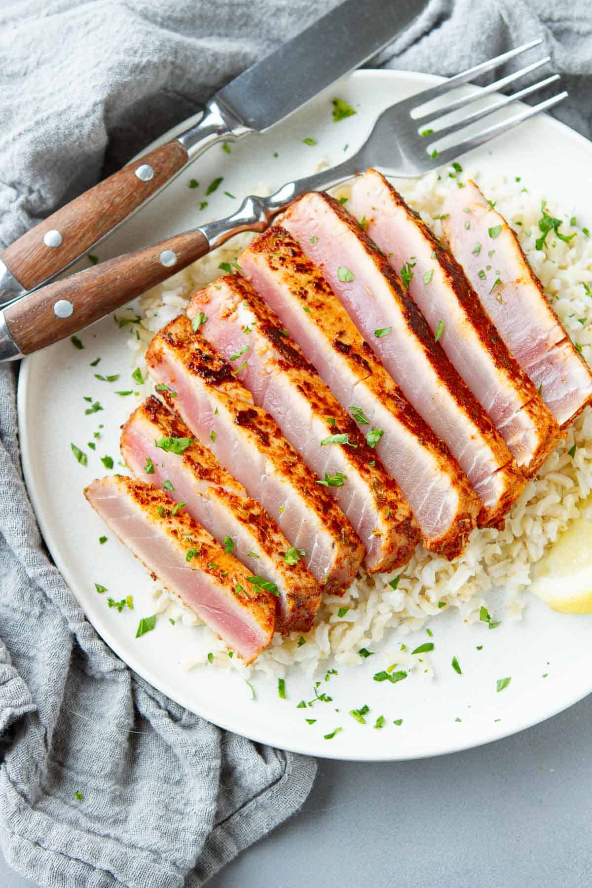 Blackened tuna is an impressive dish that can be made in just a few minutes. The end result is a mouthwatering spiced crust and perfectly cooked, rare tuna in no time.