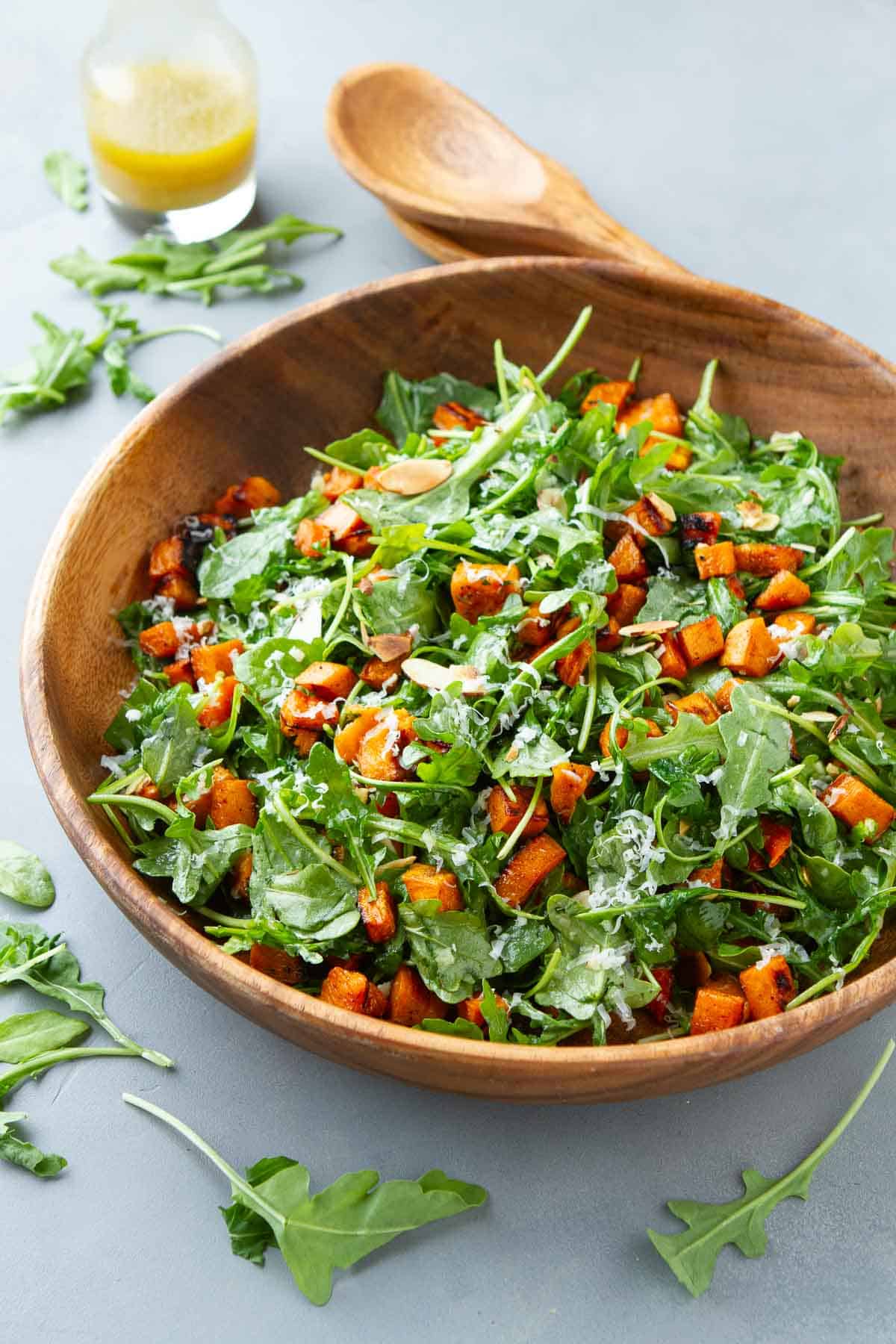 This sweet potato arugula salad is the perfect balance of sweet and savory flavors. Serve it as a healthy weeknight side dish or save it for a special holiday meal. | Recipe | Vegetarian
