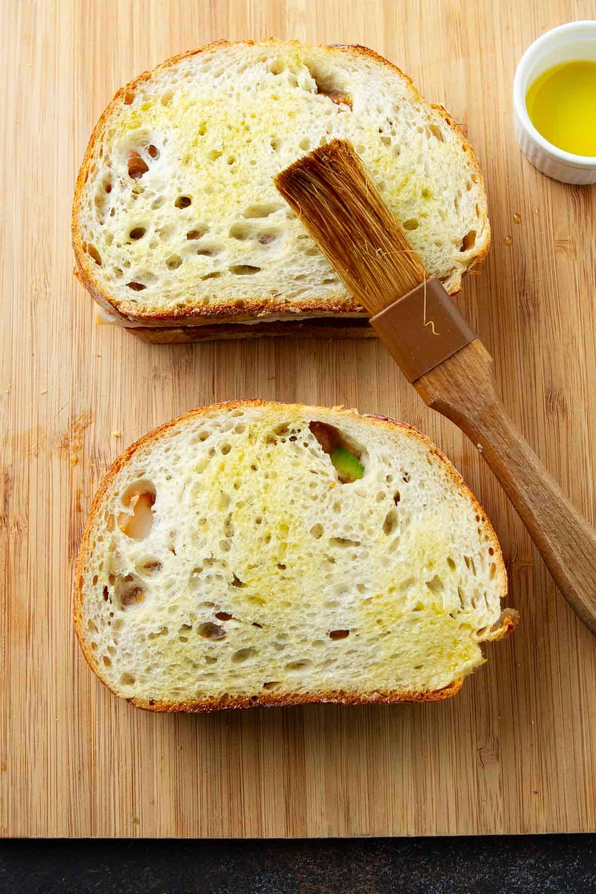 Sourdough sandwiches brushed with olive oil.