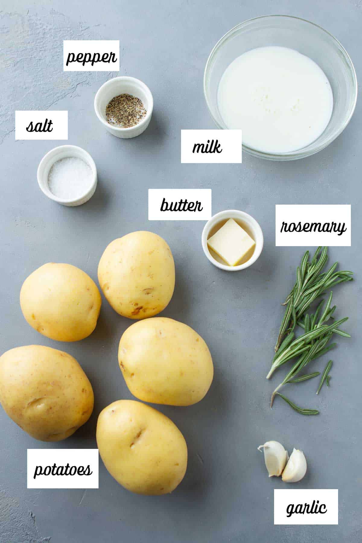 Labeled ingredients for rosemary garlic mashed potatoes.
