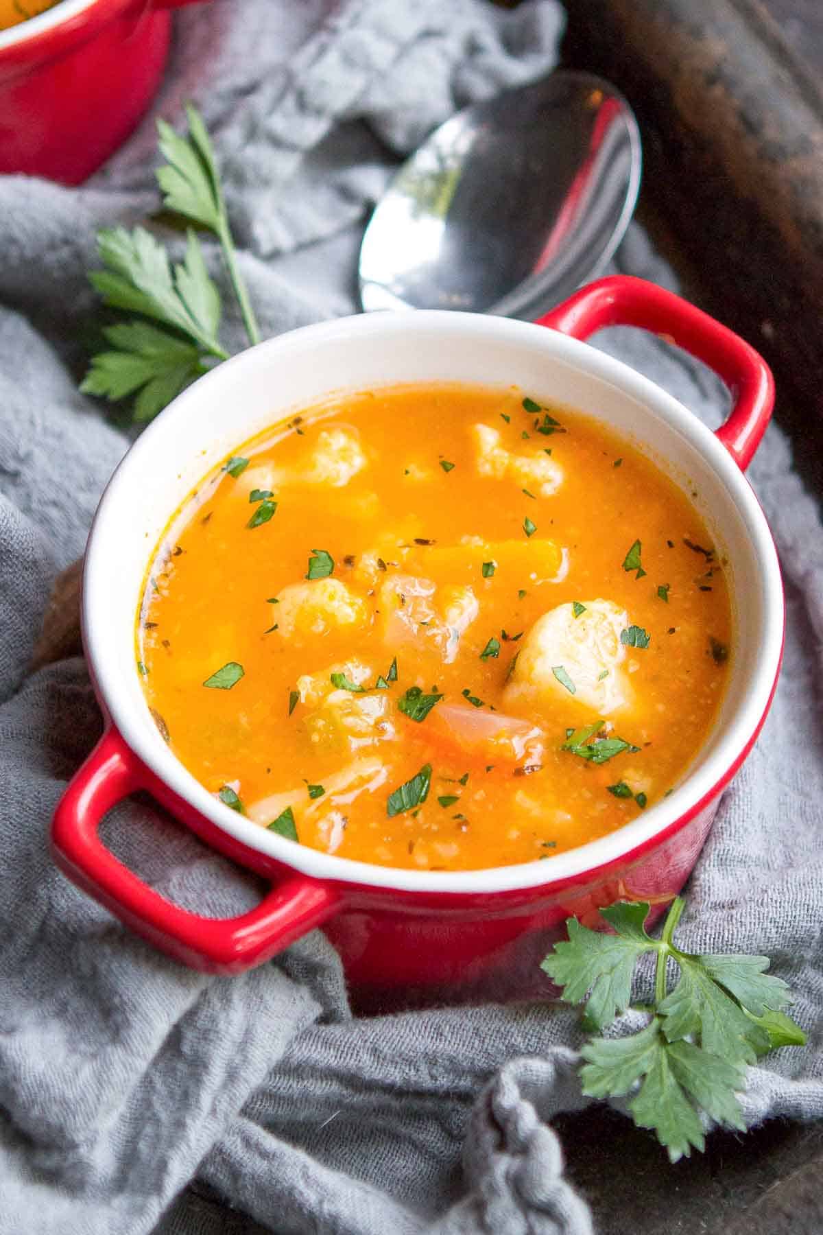 A recipe for a healthy and satisfying meal - this winter vegetable soup, with butternut squash and cauliflower is one to make again and again. | Plant based soup | Soup vegan | Vegetarian 
