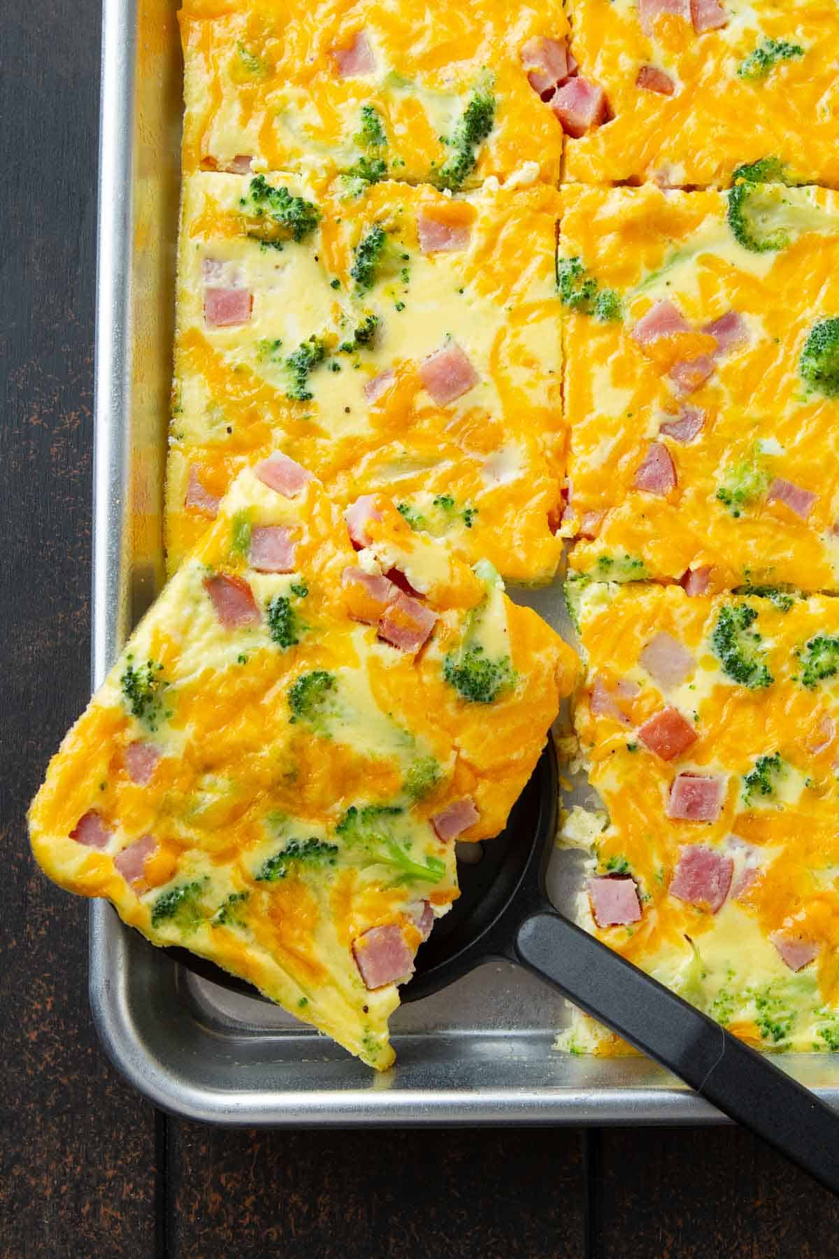 Craft a hassle-free breakfast with this sheet pan omelet – perfect for busy weekdays and lazy weekends alike. Tweak the ingredients to match your flavor preferences. | Omelette